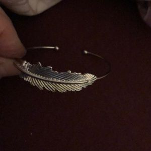Jill Michael feather cuff worn twice
